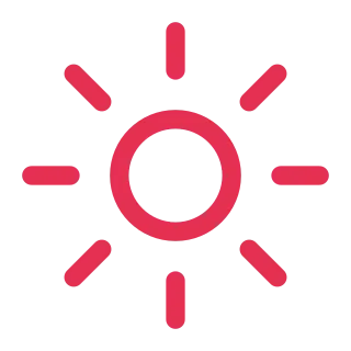 A red circular sun with eight short radiating lines.