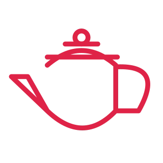 A low rounded teapot combines a long spout, a loop handle and a flat lid.