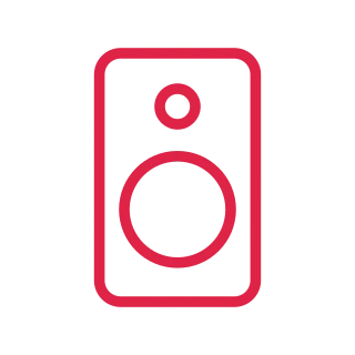 A tall speaker cabinet contains one large circular driver and a smaller tweeter.