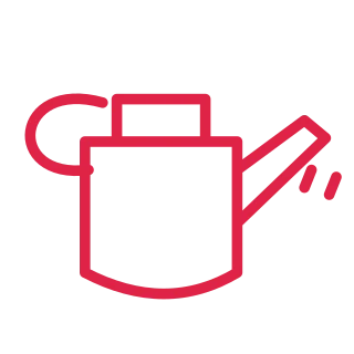 A round watering can has a loop handle, top grip and an angled spout with two drops.