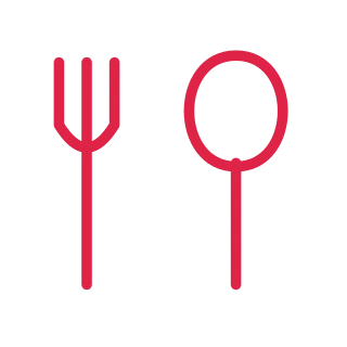 A three tine fork and an oval spoon stand side by side.