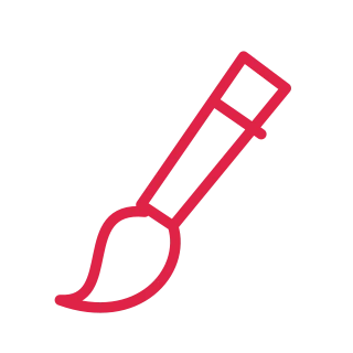 A diagonal brush has a long tapered handle and a curved tuft of bristles.