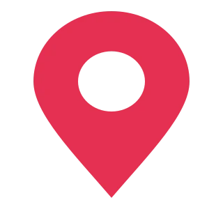 A red location marker with a circular opening in its centre.