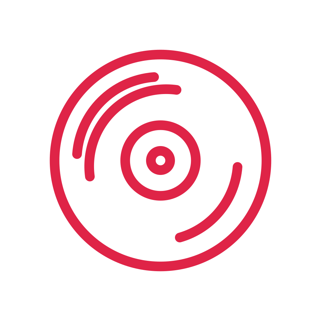 A circular vinyl record has a central label and short curved groove marks.
