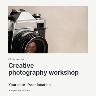 Vintage film camera on neutral backdrop in Creative photography workshop · Gallery editorial