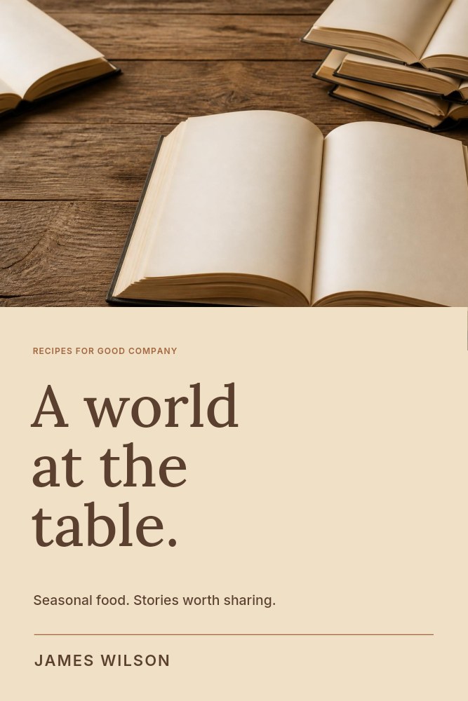 Open blank books on wooden surface in A world at the table · Cookbook cover