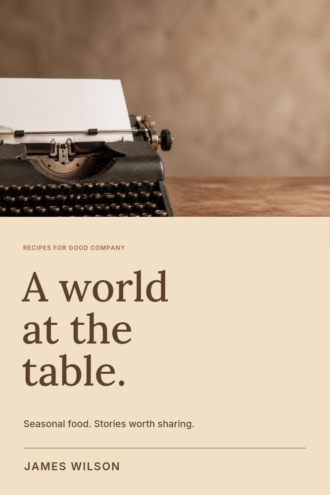 Vintage typewriter with blank paper in A world at the table · Cookbook cover